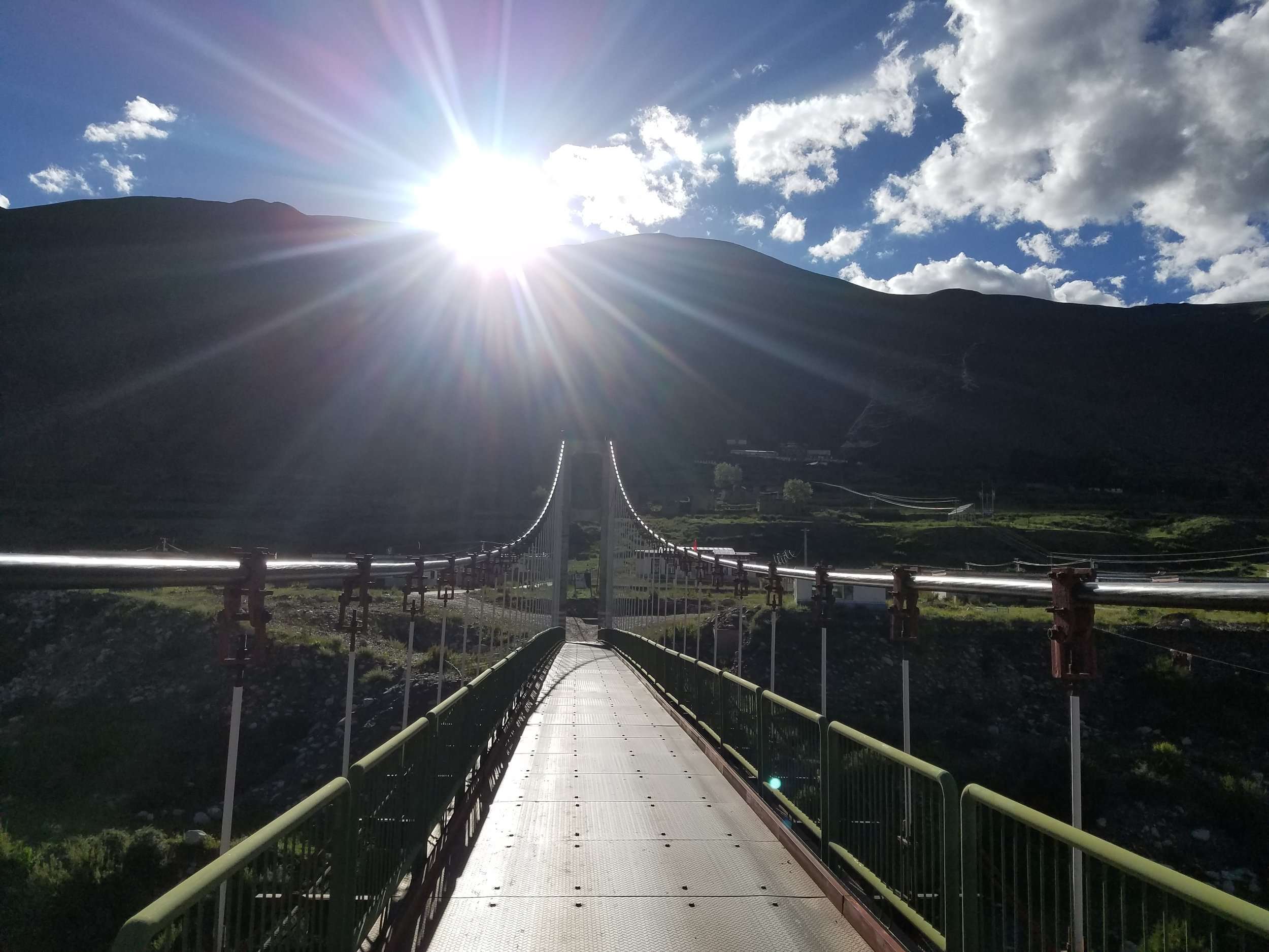 a large long train on a bridge