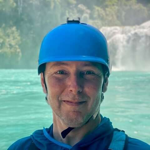 a man wearing a blue hat