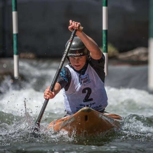 a man riding a surfboard in the water