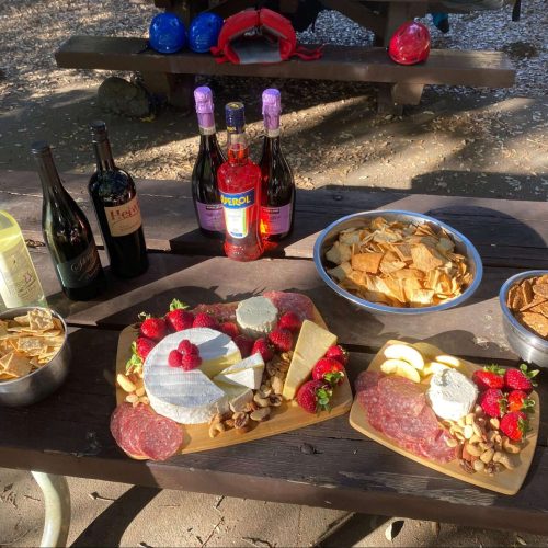 a bunch of food on a picnic table