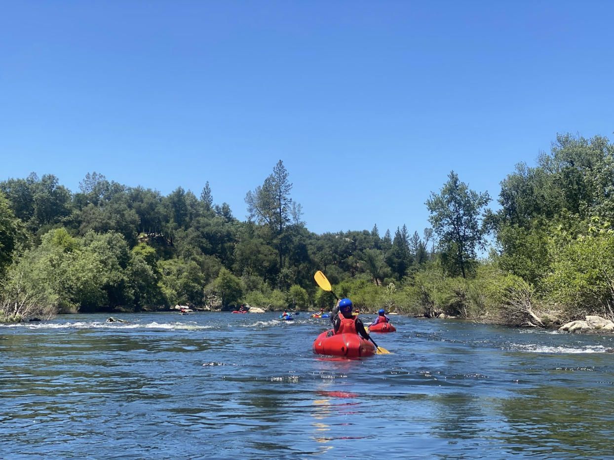 group of packrafters on the river