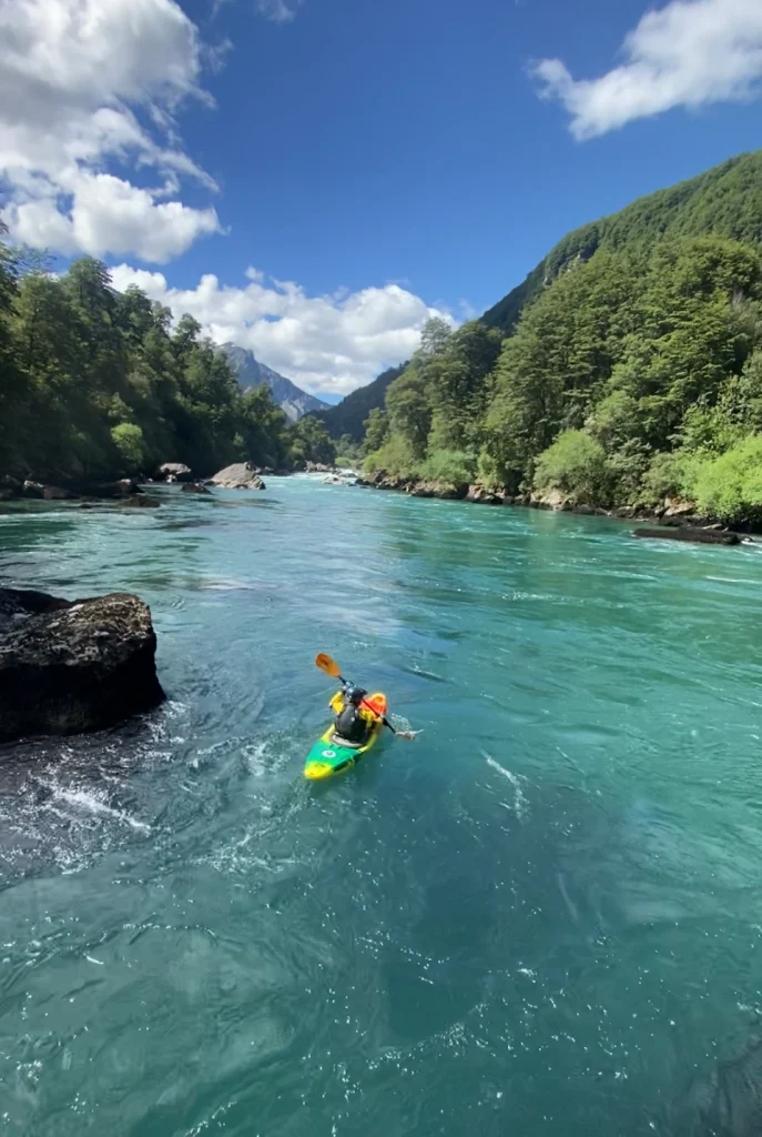 Kayaking on an emerald green river in Chile