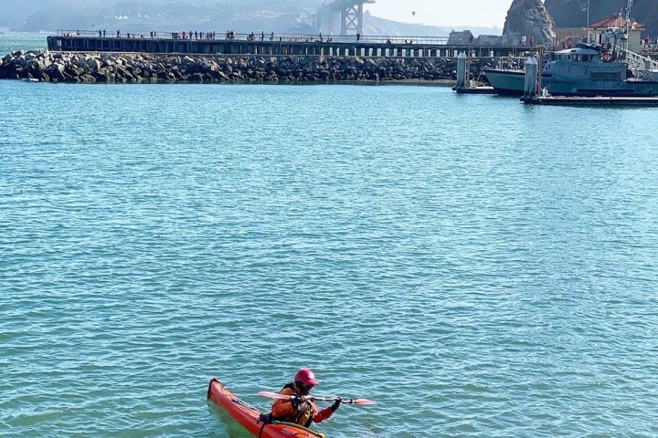 a boat traveling across a large body of water